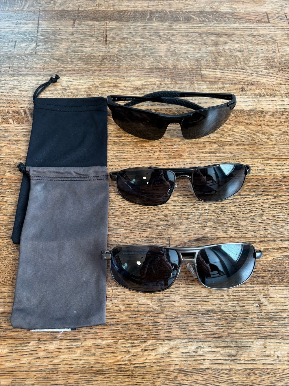 Three Pairs of Men’s Black Sunglasses.  Foster Grant Ironman, Panama Jack +1
